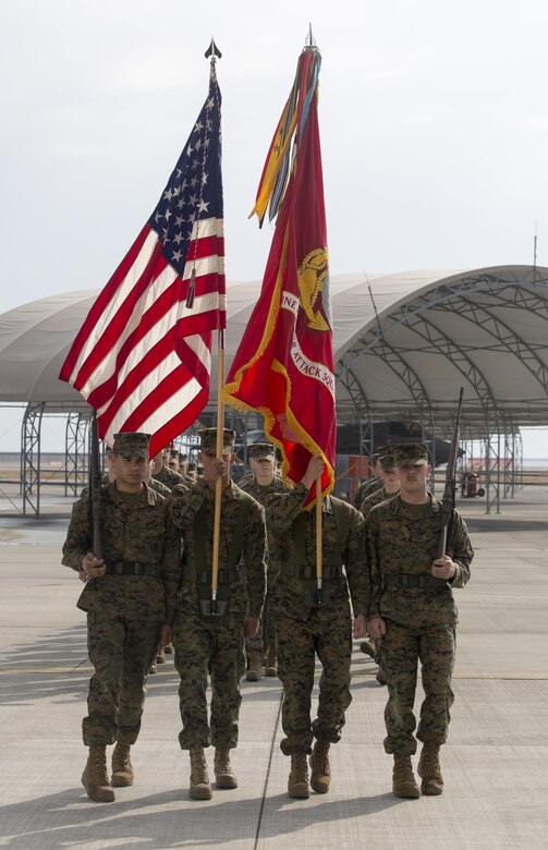 Marines, Sailors and civilian personnel gather on Marine Corps Air Station Iwakuni, Japan, to observe a change of command ceremony for Marine Fighter Attack Squadron (VMFA) 121, March 3, 2017.  Lt. Col. J.T. Bardo, outgoing commanding officer of VMFA-121, led the squadron during their move from Marine Corps Air Station Mirimar, California to MCAS Iwakuni and transferred the command to Lt. Col. Richard M. Rusnok Jr. (U.S. Marine Corps photo by Lance Cpl. Jacob A. Farbo)