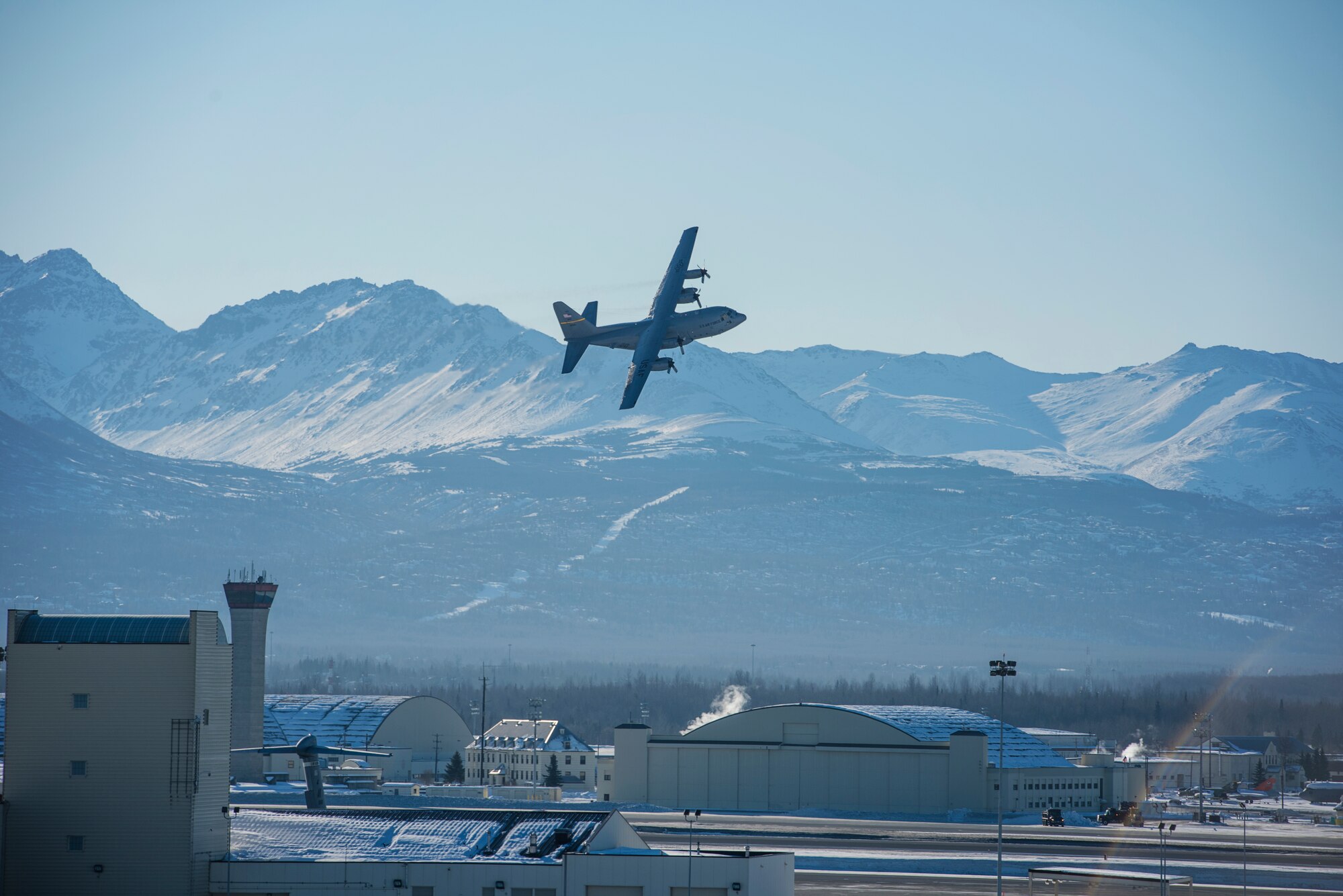A C-130 Hercules aircraft from the 144th Airlift Squadron takes off for the last time from Joint Base Elmendorf-Richardson, Alaska, March 5, 2017. After 41 years of flying the C-130 aircraft, the 144th Airlift Squadron’s 12 C-130s were divested, with the planes either being transferred to outside units or retired from service. The final two C-130H airframes departed on this date. (U.S. Air National Guard photo by Staff Sgt. Edward Eagerton/released)