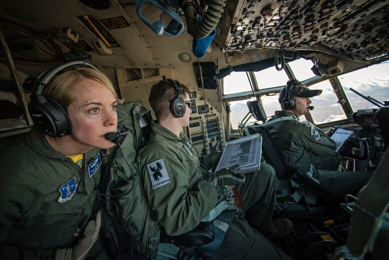Crew members from the 144th Airlift Squadron, Alaska Air National Guard, fly a C-130 Hercules aircraft on the unit’s final flight with the C-130s, March 4, 2017. After 41 years of flying the C-130 aircraft, the 144th Airlift Squadron’s 12 C-130s were divested, with the planes either being transferred to outside units or retired from service. The unit’s last two aircraft departed Joint Base Elmendorf-Richardson, Alaska, the following day. (U.S. Air National Guard photo by Staff Sgt. Edward Eagerton/released)