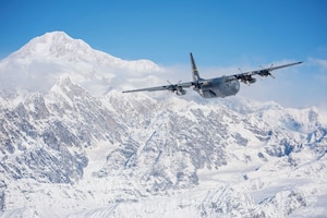 A C-130 Hercules from the 144th Airlift Squadron, Alaska Air National Guard, flies away from Denali, the highest point in North America, March 4, 2017. After 41 years of flying the C-130 aircraft, the 144th Airlift Squadron’s 12 C-130s were divested, with the planes either being transferred to outside units or retired from service. The unit’s last two aircraft departed Joint Base Elmendorf-Richardson, Alaska, the following day. (U.S. Air National Guard photo by Staff Sgt. Edward Eagerton/released)