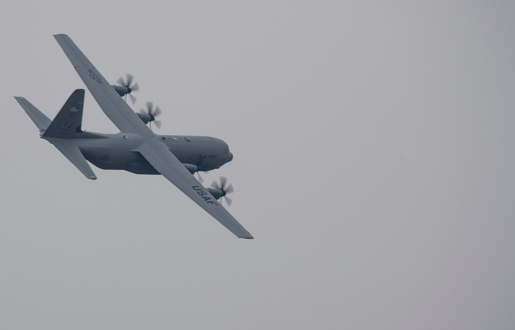 A C-130J Super Hercules with the 36th Airlift Squadron flies over Yokota Air Base, Japan, March 6, 2016. Compared to older C-130s, the J model climbs faster and higher, flies farther at a higher cruise speed, and takes off and lands in a shorter distance. (U.S. Air Force photo by Staff Sgt. David Owsianka)