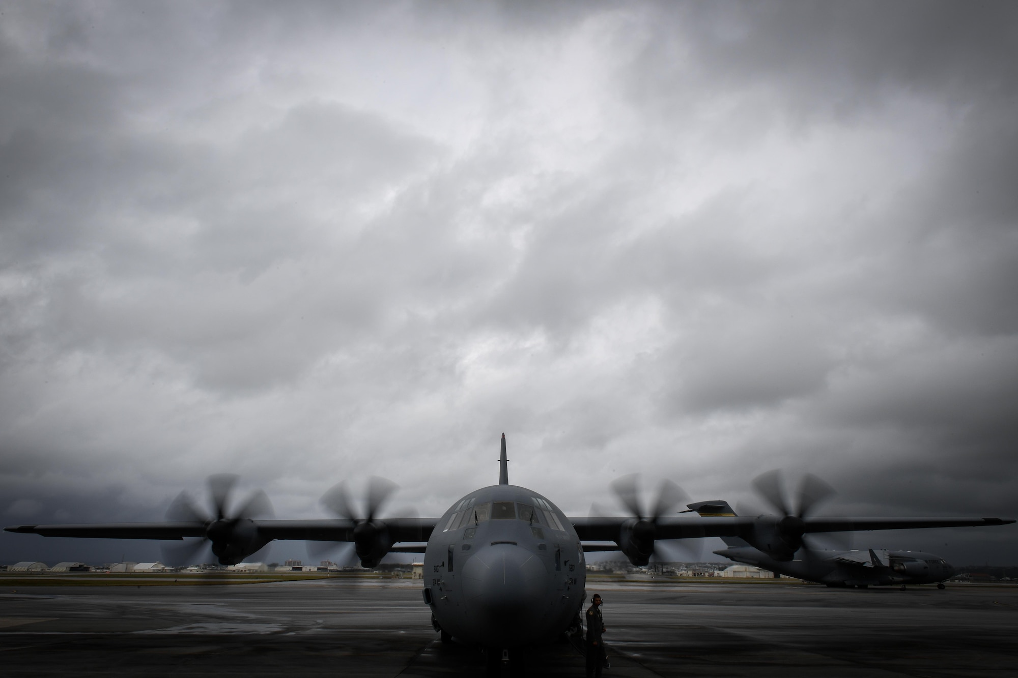 A loadmaster with the 36th Airlift Squadron performs a pre-flight inspection at Kadena Air Base, Japan, March 6, 2017. This is the first C-130J to be assigned to Pacific Air Forces. Yokota serves as the primary Western Pacific airlift hub for U.S. Air Force peacetime and contingency operations. Missions include tactical air land, airdrop, aeromedical evacuation, special operations and distinguished visitor airlift. (U.S. Air Force photo by Staff Sgt. Michael Smith)