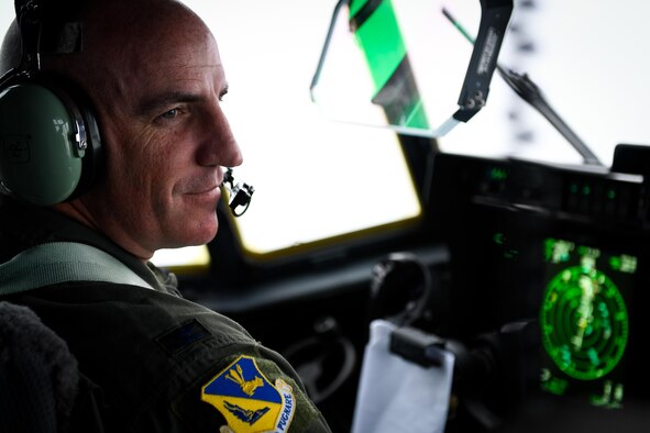 Col. Kenneth Moss, 374th Airlift Wing commander, flies over the Pacific Ocean, March 6, 2017. This is the first C-130J to be assigned to Pacific Air Forces.  Yokota serves as the primary Western Pacific airlift hub for U.S. Air Force peacetime and contingency operations. Missions include tactical air land, airdrop, aeromedical evacuation, special operations and distinguished visitor airlift. (U.S. Air Force photo by Staff Sgt. Michael Smith)