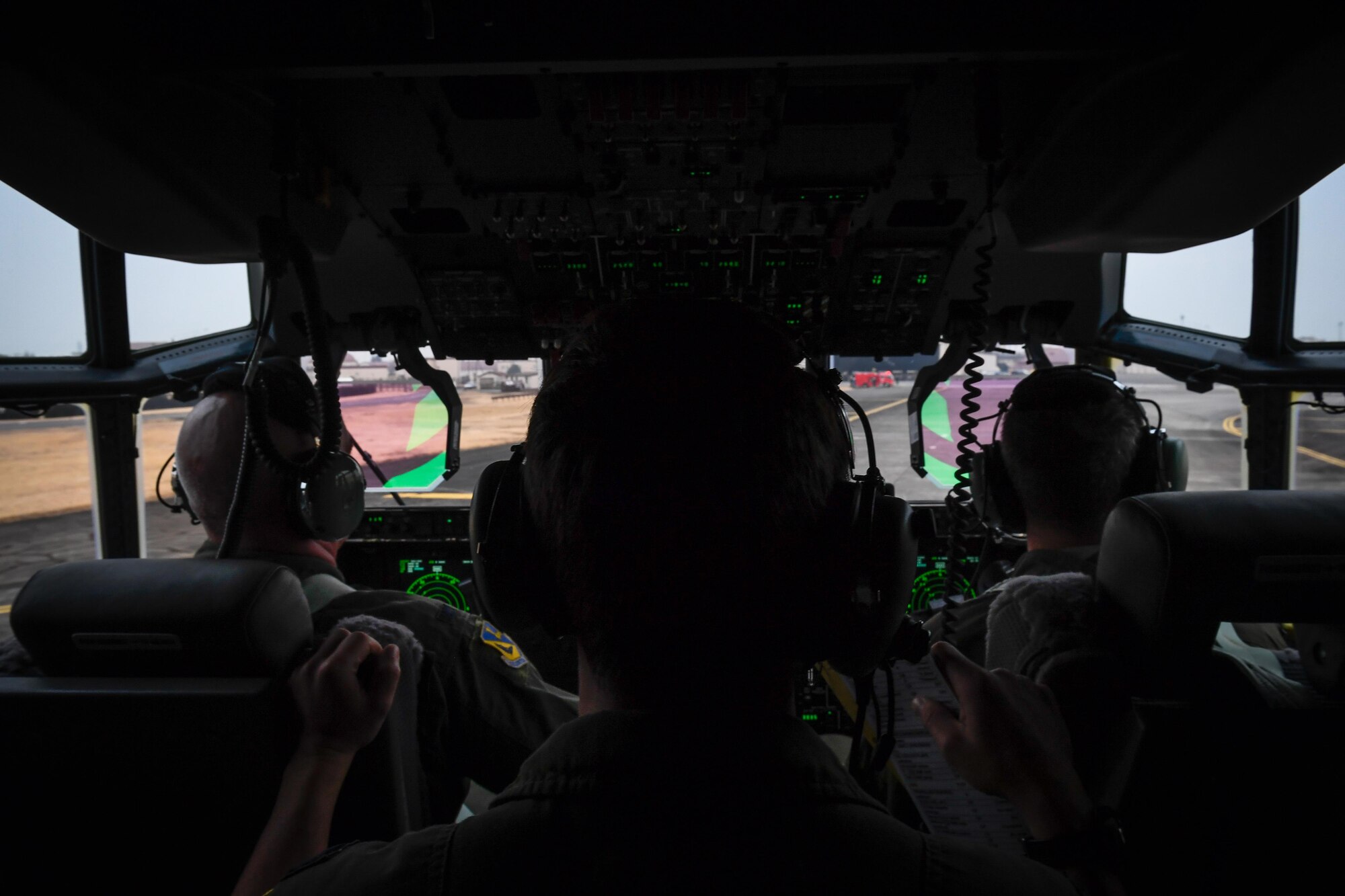 Col. Kenneth Moss, 374th Airlift Wing commander, and Maj. Jesse Klaetsch, 36th Airlift Squadron C-130J pilot, touch down at Yokota Air Base, Japan, March 6, 2017. This is the first C-130J to be assigned to Pacific Air Forces.  Yokota serves as the primary Western Pacific airlift hub for U.S. Air Force peacetime and contingency operations. Missions include tactical air land, airdrop, aeromedical evacuation, special operations and distinguished visitor airlift. (U.S. Air Force photo by Staff Sgt. Michael Smith)