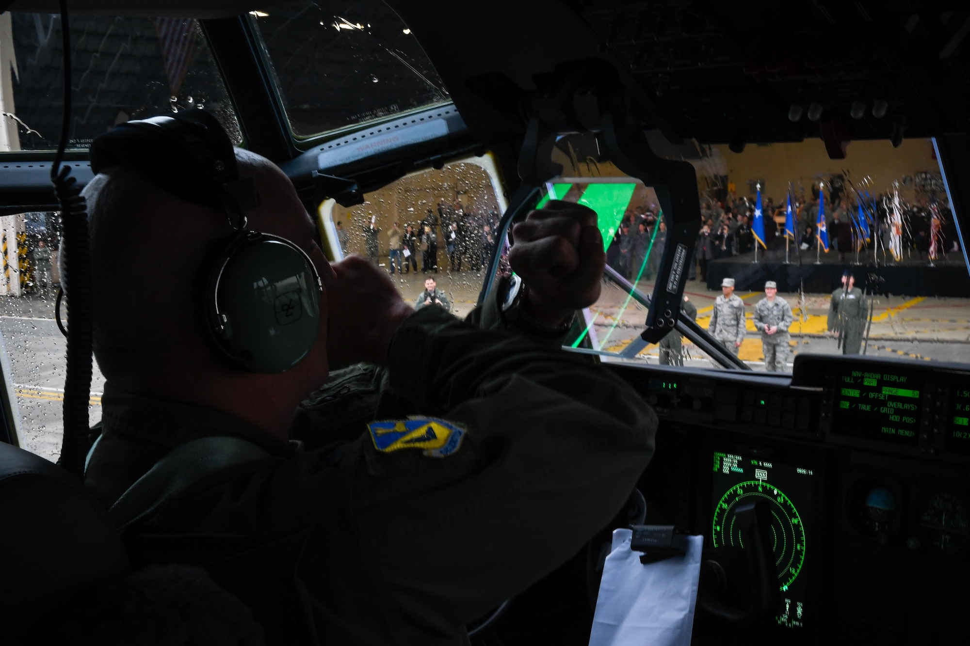 Col. Kenneth Moss, 374th Airlift Wing commander, signals to a crew chief in position as he prepares to stop at Yokota Air Base, Japan, March 6, 2017. This is the first C-130J to be assigned to Pacific Air Forces. Yokota serves as the primary Western Pacific airlift hub for U.S. Air Force peacetime and contingency operations. Missions include tactical air land, airdrop, aeromedical evacuation, special operations and distinguished visitor airlift. (U.S. Air Force photo by Staff Sgt. Michael Smith)