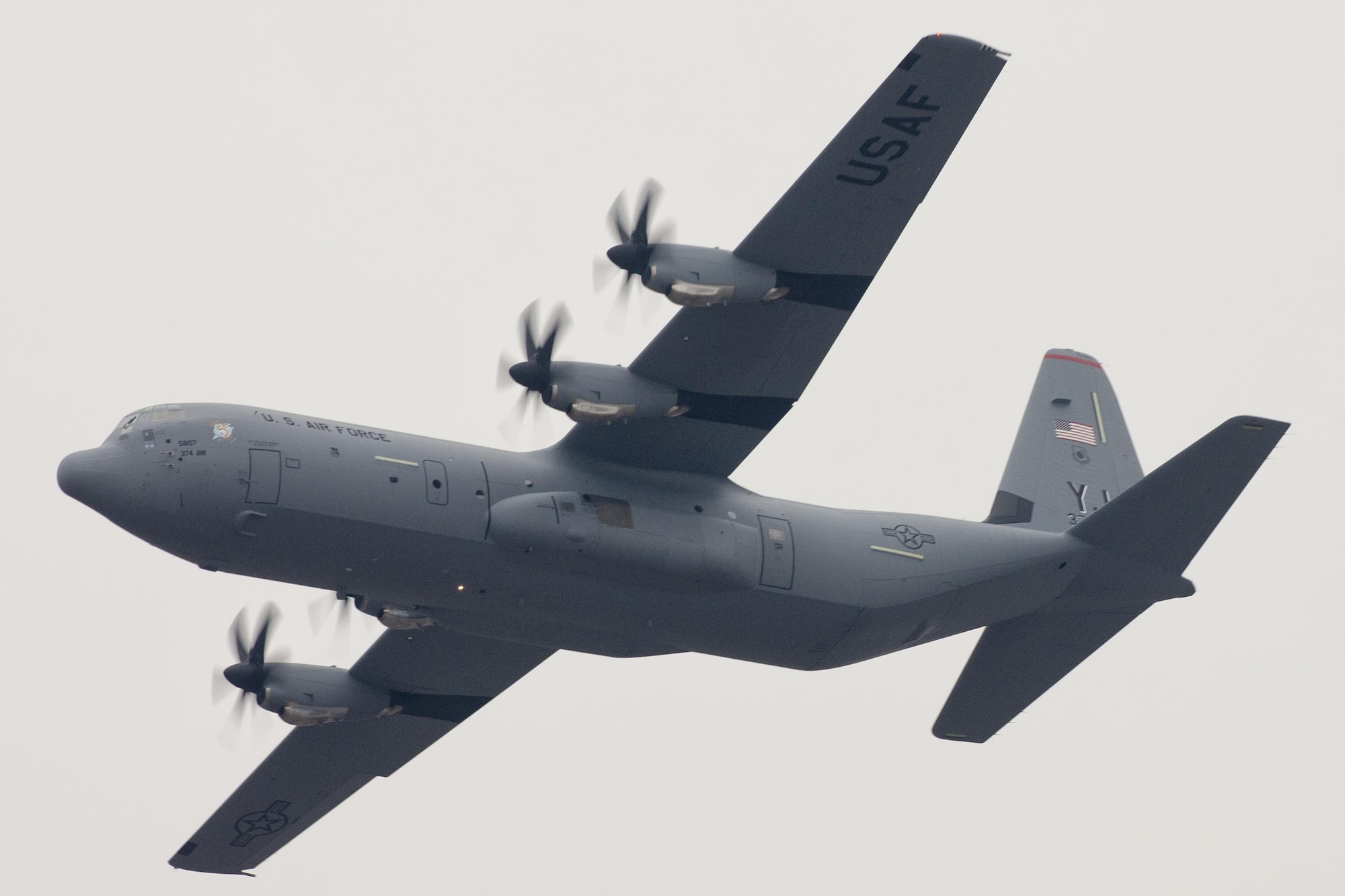 A C-130J Super Hercules flies over Yokota Air Base, Japan, March 6, 2017. This is the first C-130J to be assigned to Pacific Air Forces. Yokota serves as the primary Western Pacific airlift hub for U.S. Air Force peacetime and contingency operations. Missions include tactical air land, airdrop, aeromedical evacuation, special operations and distinguished visitor airlift.(U.S. Air Force photo by Yasuo Osakabe)
