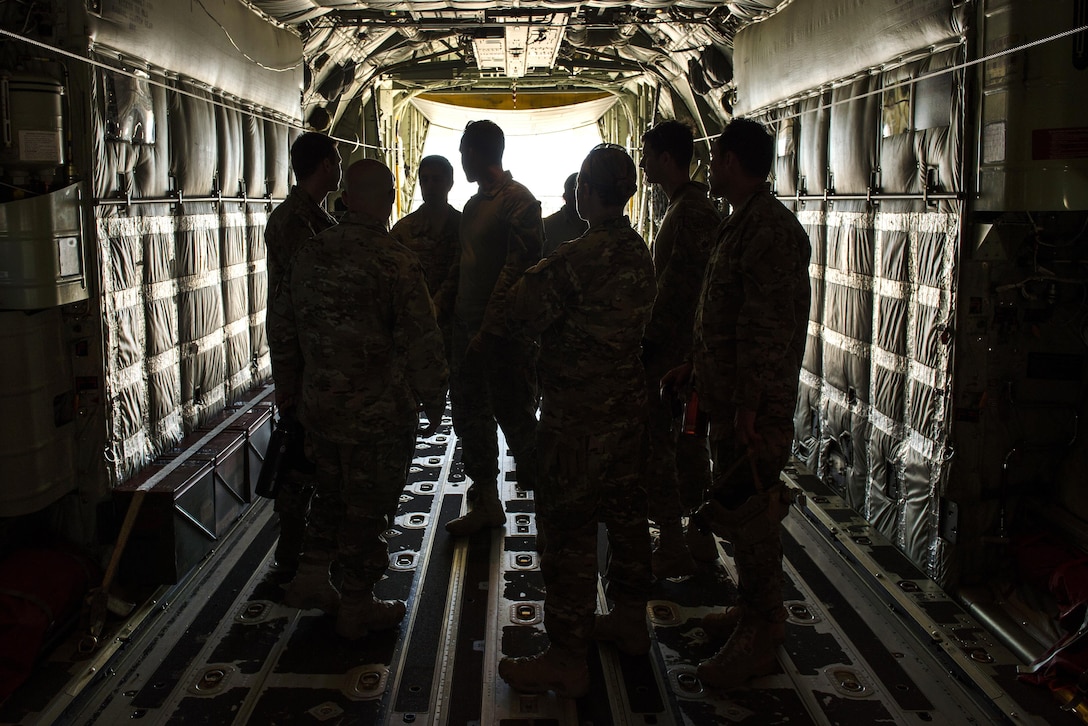 Airmen receive a safety brief aboard a MC-130J Commando II aircraft before participating in static load training during the Emerald Warrior 17 exercise at Hurlburt Field, Fla., Feb. 26, 2017. The airmen are assigned to the 24th and 27th Special Operations Wings. Emerald Warrior is a U.S. Special Operations Command exercise during which joint special operations forces train to respond to various threats across the spectrum of conflict. Air Force photo by Senior Airman Erin Piazza