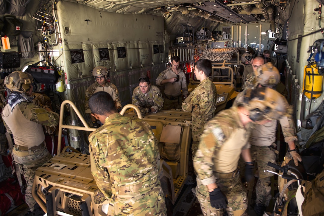 Airmen prepare to offload Polaris MRZR light tactical all-terrain vehicles from an MC-130J Commando II aircraft during static load training as part of the Emerald Warrior 17 exercise at Hurlburt Field, Fla., Feb. 26, 2017. Air Force photo by Senior Airman Erin Piazza