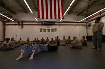 Airmen from the 86th Security Forces Squadron and U.S. Forces Police Squadron participate in a combatives class at the 435th SFS on Ramstein Air Base, Germany. The 435th SFS conducts the Fly Away Security Training program to prepare Security Forces Airmen to prepare them for scenarios they may face on a mission. The FAST program caters to Airmen providing security for aircraft. (U.S. Air Force photo by Airman 1st Class Joshua Magbanua)