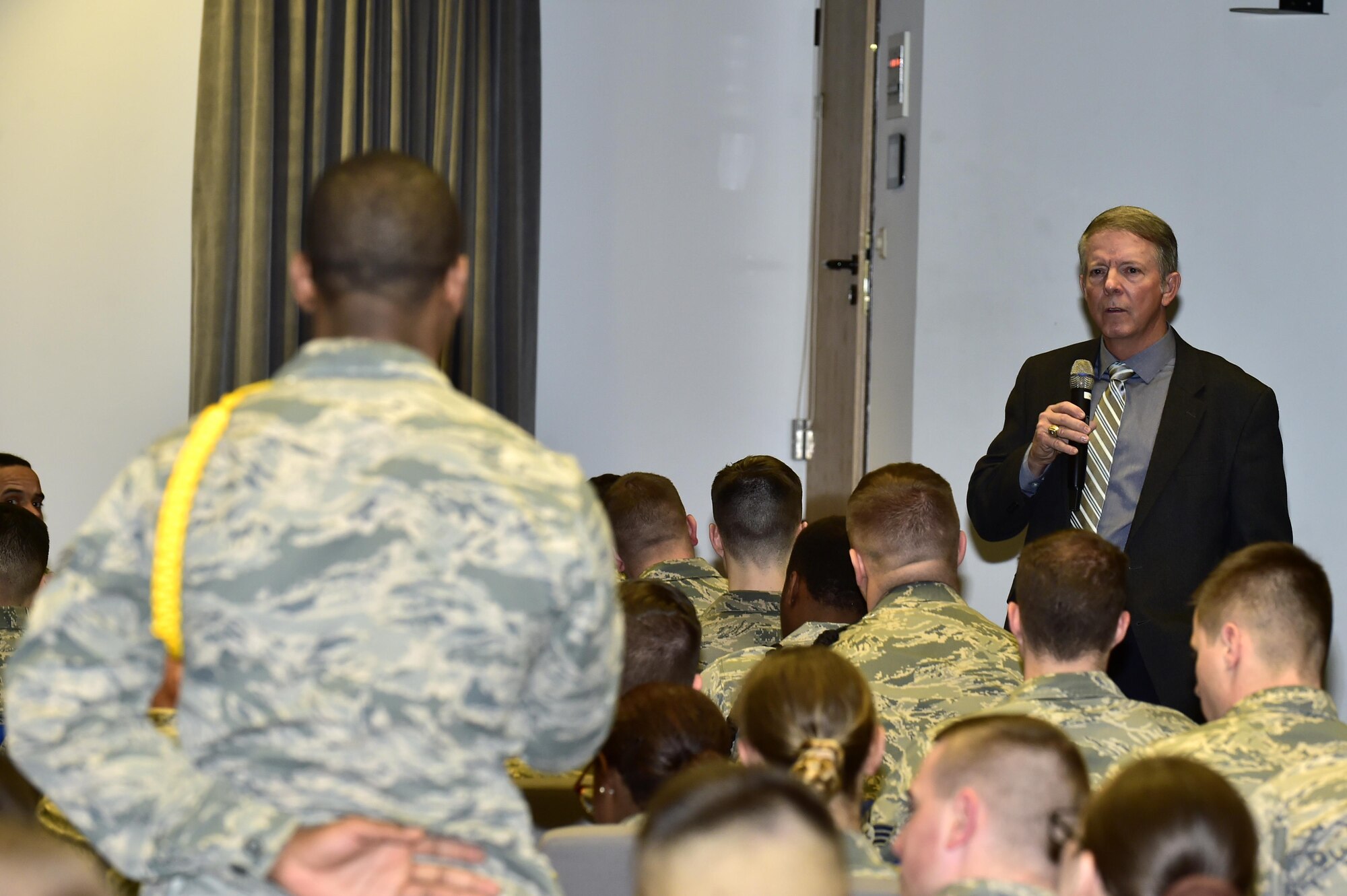 Retired Chief Master Sgt. of the Air Force Rodney J. McKinley listens to a question from a student during a question and answer time at the Chief Master Sgt. of the Air Force Richard D. Kisling NCO Academy on Kapaun Air Station, Germany, March 3, 2017. McKinley spoke about the importance of effective listening in the leader and follower relationship. (U.S. Air Force photo by Senior Airman Jonathan Bass)