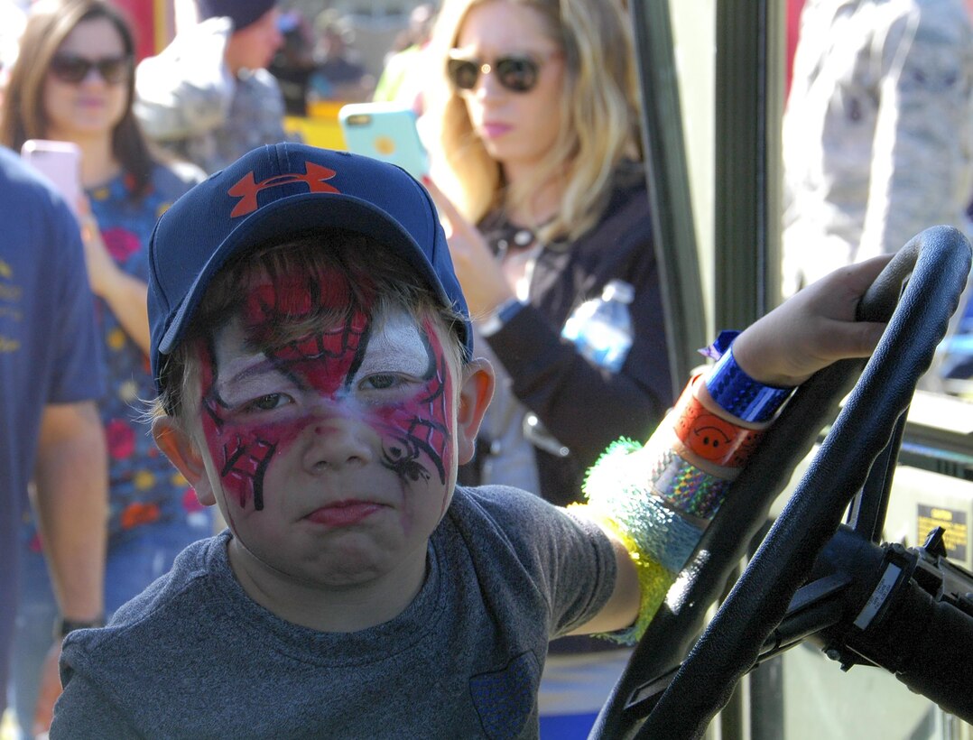 Spiderman sits in the cab of a military vehicle during the 919th Special Operations Wing’s annual Wing Day March 4 at Duke Field, Fla.  The wing sets aside a special day each year to show appreciation for its reservists and their family members. Events included music, food, children’s games, etc. (U.S. Air Force photo/1st Lt. Monique Roux)