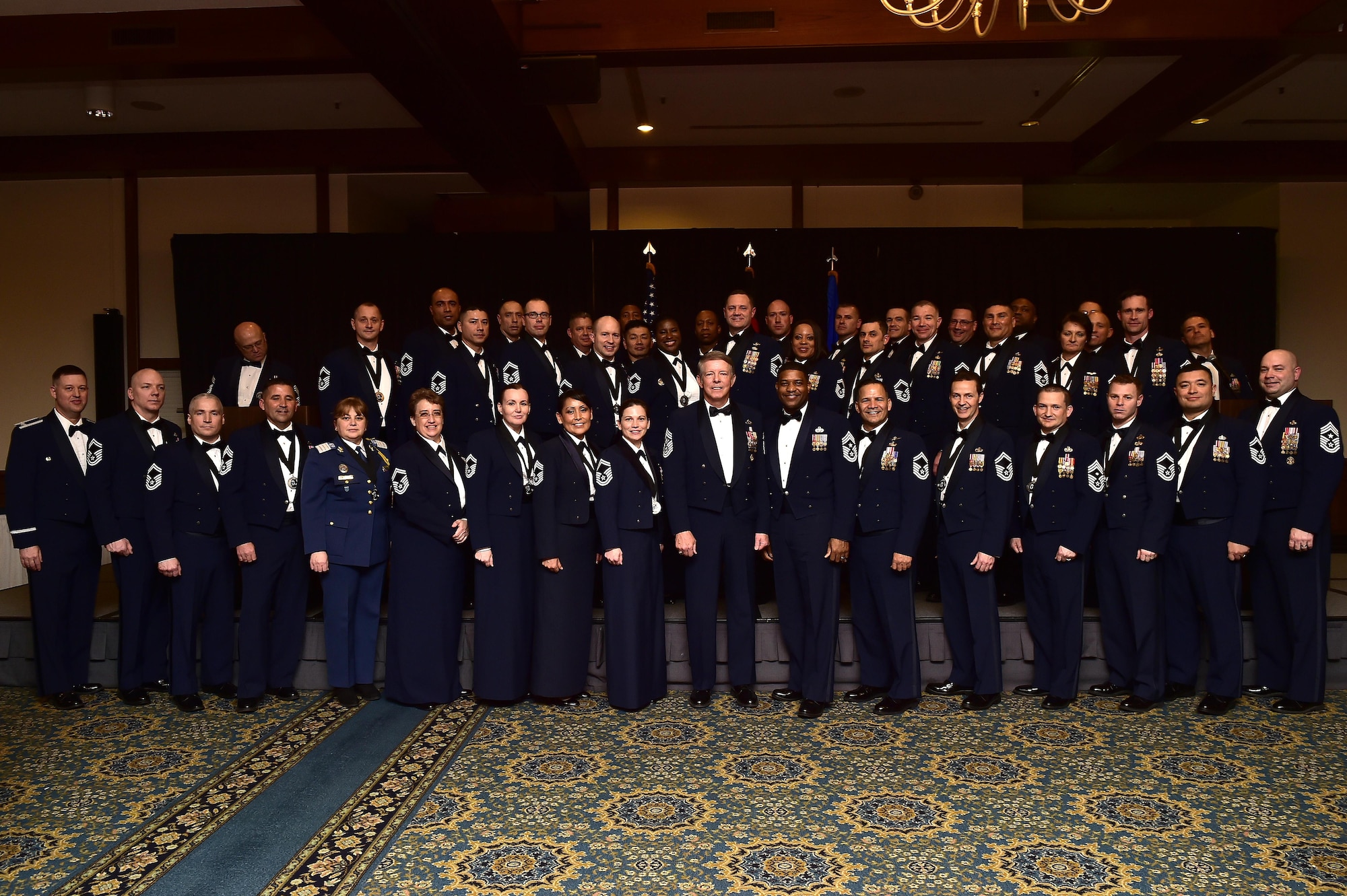 New chief master sergeants pose for a photo with Retired Chief Master Sgt. of the Air Force Rodney J. McKinley, center, Chief Master Sgt. Phillip Easton, U.S. Air Forces in Europe and Air Forces Africa command chief, center, Col. Brandon Hileman, 86th Airlift Wing vice commander, left, and Chief Master Sgt. Aaron Bennett, 86th AW command chief, after the Chief Recognition Ceremony on Ramstein Air Base, Germany, March 3, 2017. McKinley was the key note speaker for the ceremony. (U.S. Air Force photo by Senior Airman Jonathan Bass)