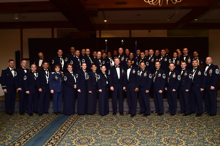 New chief master sergeants pose for a photo with Retired Chief Master Sgt. of the Air Force Rodney J. McKinley, center, Chief Master Sgt. Phillip Easton, U.S. Air Forces in Europe and Air Forces Africa command chief, center, Col. Brandon Hileman, 86th Airlift Wing vice commander, left, and Chief Master Sgt. Aaron Bennett, 86th AW command chief, after the Chief Recognition Ceremony on Ramstein Air Base, Germany, March 3, 2017. McKinley was the key note speaker for the ceremony. (U.S. Air Force photo by Senior Airman Jonathan Bass)