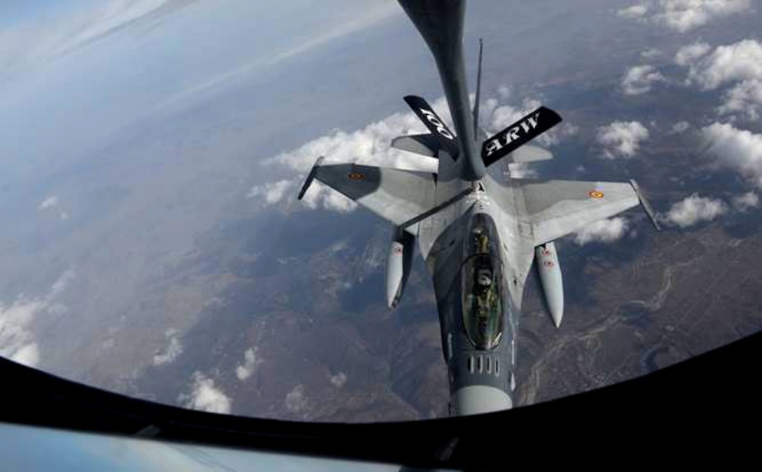 A Romanian air force F-16 Flighting Falcon makes contact with a U.S. Air Force KC-135 Stratotanker for the first time Feb. 28, 2017, during air refueling training over Bucharest, Romania. With the help of the U.S. Air Force 100th Air Refueling Wing and one of their Stratotankers, the RoAF became certified to refuel from all U.S. KC-135s, strengthening partnerships and regional stability. (U.S. Air Force photo by Staff Sgt. Kate Thornton)