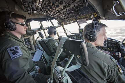 Crew members from the 144th Airlift Squadron, Alaska Air National Guard, along with Col. Steven deMilliano, right, the 176th Wing commander, fly a C-130 Hercules aircraft on the unit’s final flight with the C-130s, March 4, 2017. After 41 years of flying the C-130 aircraft, the 144th Airlift Squadron’s eight C-130s were divested, with the planes either being transferred to outside units or retired from service. The unit’s last two aircraft departed Joint Base Elmendorf-Richardson, Alaska, the following day.