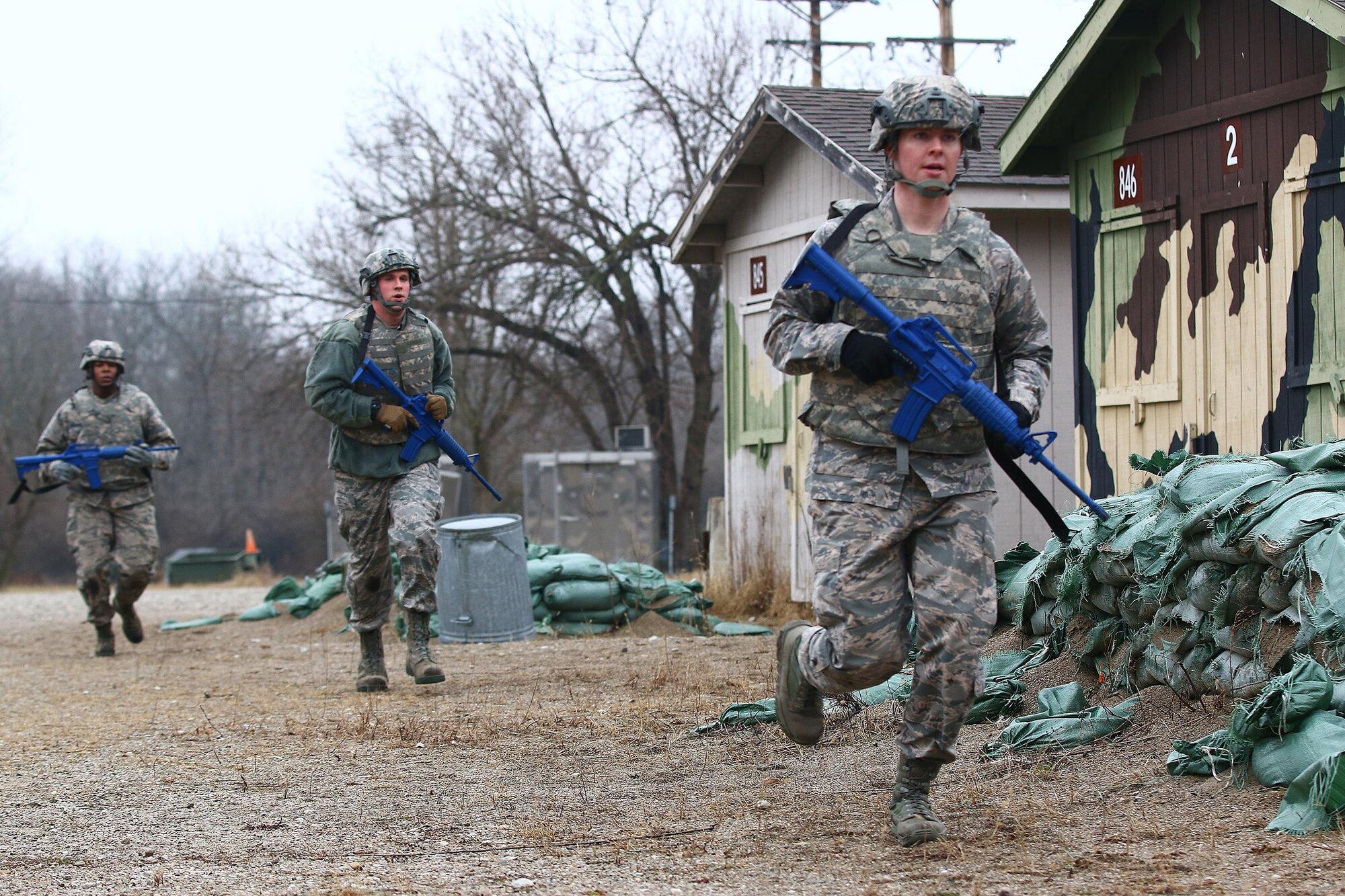 Members of the 445th Security Forces Squadron endure the ‘Winter Challenge’ here Feb. 12, 2017. The challenge is designed to provide an experience during inclement weather. The event consisted of several stages to include: vehicle inspections, ammo carries, MOUT (military operations in urban terrain), rolling a large tire and pushing a Humvee more than 200 feet. (U.S. Air Force photo /Tech. Sgt. Patrick O’Reilly)