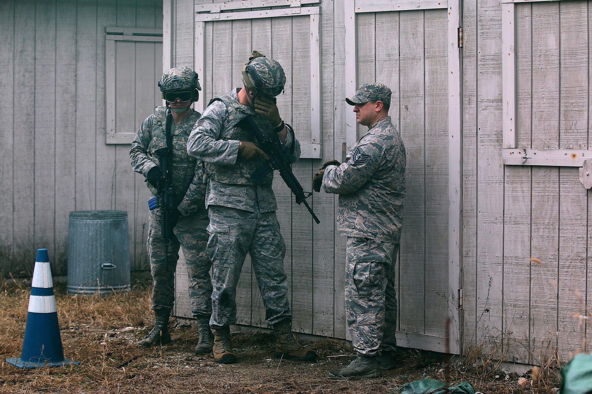 Members of the 445th Security Forces Squadron endure the ‘Winter Challenge’ here Feb. 12, 2017.   The challenge is designed to provide an experience during inclement weather. The event consisted of several stages to include: vehicle inspections, ammo carries, MOUT (military operations in urban terrain), rolling a large tire and pushing a Humvee more than 200 feet.  (U.S. Air Force photo /Tech. Sgt. Patrick O’Reilly)