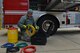 U.S. Air Force Senior Airman Dalton Granville, 20th Civil Engineer Squadron fire department driver operator, inspects hoses at Shaw Air Force Base, S.C., March 6, 2017. Firefighters use the hoses for an air bag system, which allows them to save people trapped underneath heavy objects. (U.S. Air Force photo by Airman 1st Class Destinee Sweeney)