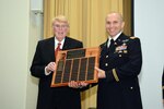 Maj. Kurt Fossum (right) of Joint Base San Antonio-Fort Sam Houston was recognized with the 2016 Lt. Gen. Frank Ledford, Jr. Physician Assistant Post-Graduate Research Award at a March 3 ceremony presented by the U.S. Army Medical Specialist Corps at Blesse Auditorium. Ledford (left) presented the award to Fossum at the ceremony.