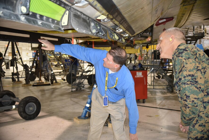 Craig Rayner, with the 564th Aircraft Maintenance Squadron, left, discusses programmed depot maintenance being performed on the KC-135 Stratotanker with United States Marine Corps Lt. Gen. Michael Dana, deputy commandant, Installations and Logistics, at the Pentagon, during General Dana’s tour of Tinker Air Force Base on Feb. 21.  (Air Force photo by Darren D. Heusel)