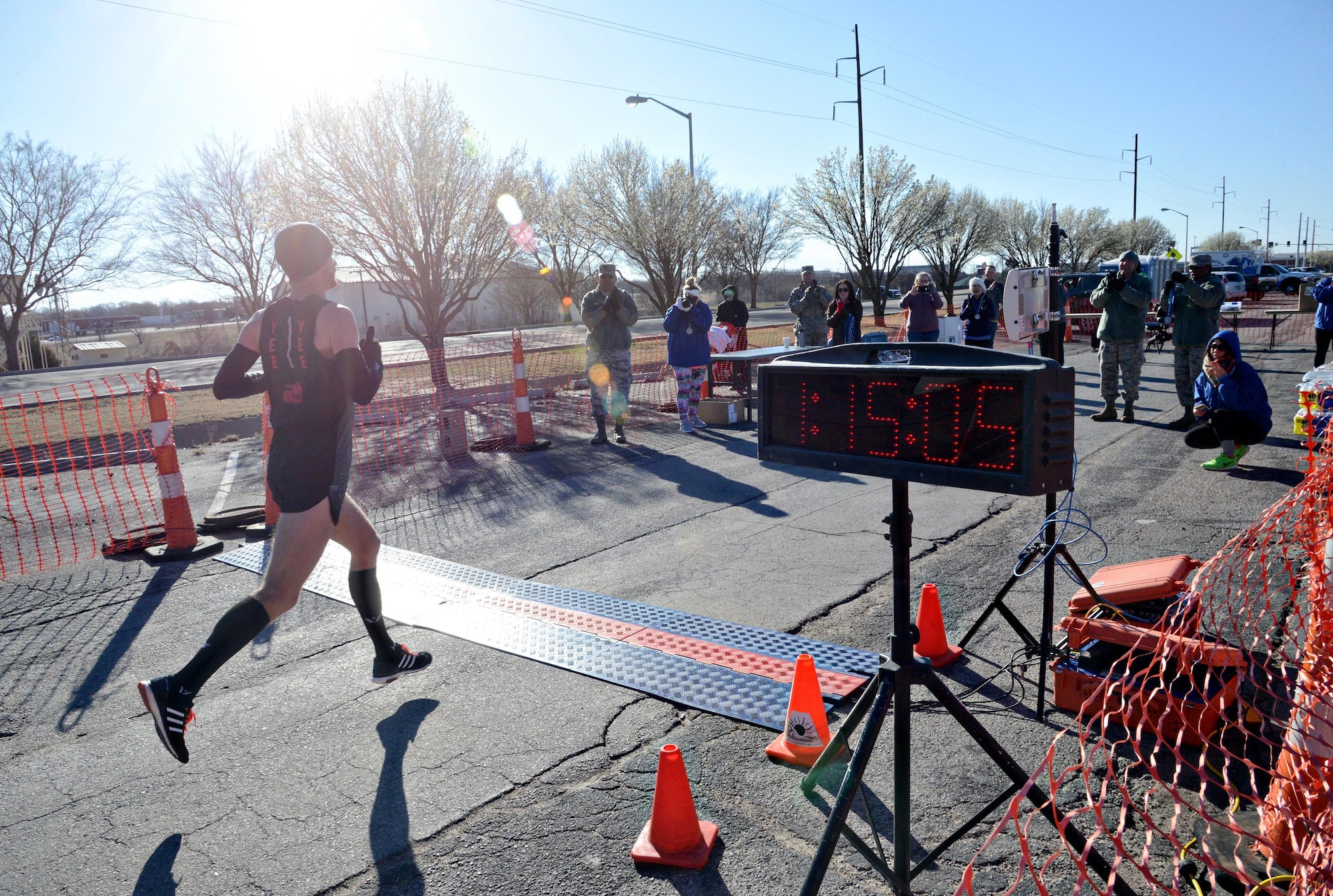 Jason Butler, a tool maker with the 553rd Commodities Maintenance Group, was the first place finisher in the 75th Anniversary Half Marathon, with a final time of 1:15:06.  (Air Force photo by Kelly White)