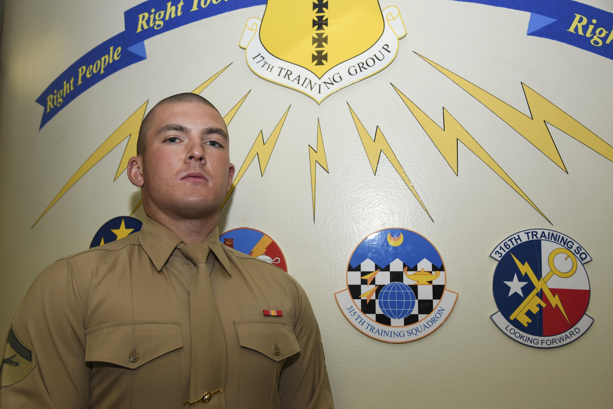 U.S. Marine Corps Lance Cpl. Michael Coleman, 316th Training Squadron student, stands for a portrait at Brandenburg Hall on Goodfellow Air Force Base, Texas, March 3, 2017. Coleman is the Goodfellow Student of the Month spotlight for February 2017, a series highlighting Goodfellow students. (U.S. Air Force photo by Airman 1st Class Chase Sousa/Released)