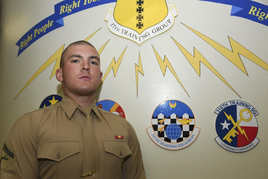 U.S. Marine Corps Lance Cpl. Michael Coleman, 316th Training Squadron student, stands for a portrait at Brandenburg Hall on Goodfellow Air Force Base, Texas, March 3, 2017. Coleman is the Goodfellow Student of the Month spotlight for February 2017, a series highlighting Goodfellow students. (U.S. Air Force photo by Airman 1st Class Chase Sousa/Released)