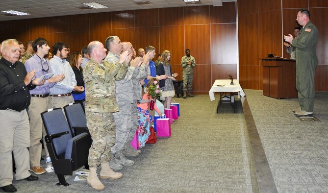 Lt. Col. Dustin Hiers greets his new squadron and well-wishers during  the 919th Special Operations Support Squadron change of command ceremony March 3 at Duke Field, Fla. (U.S. Air Force photo/Dan Neely)