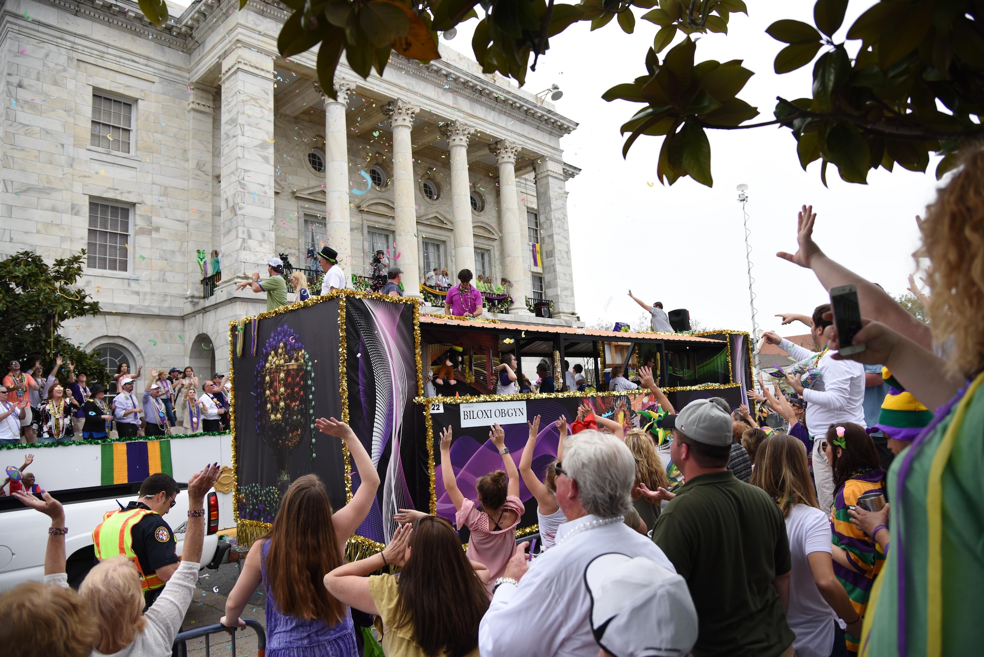 A float passes in front of Biloxi City Hall during the Gulf Coast Carnival Association Mardi Gras parade Feb. 28, 2017, in Biloxi, Miss. Every Mardi Gras season, Keesler personnel participate in local parades to show their support of the communities surrounding the installation. (U.S. Air Force photo by Kemberly Groue)