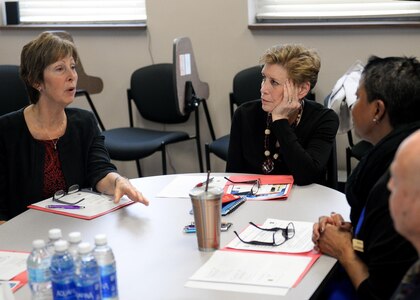 Ellyn Dunford (center), wife of U.S. Marine Corps Gen. Joseph F. Dunford, Jr., Chairman of the Joint Chiefs of Staff, meets with Laura Hyten (left), wife of U.S. Air Force Gen. John E. Hyten, commander of U.S. Strategic Command, and Billie Gaines (right), chief of the Offutt Airman and Family Readiness Center (A&FRC) chief, and other A&FRC personnel at Offutt Air Force Base, Neb., March 2, 2017.  During her visit, Dunford toured the SAC Chapel, A&FRC and the Offutt Air Force Base Chapel's Airmen Ministry Center. Dunford also met with junior enlisted spouses and had discussions with key base leadership and airmen on spouse resiliency, retiring personnel mentorship, and wounded warriors. Dunford’s volunteer efforts include the Navy-Marine Corps Relief Society, Leadership Education Seminar, various spouse clubs and family readiness programs.