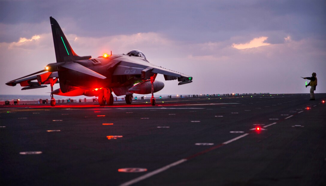 A Marine Corps AV-8B Harrier II takes off from the flight deck of the amphibious assault ship USS Bonhomme Richard during night operations in the Philippine Sea, March 2, 2017. The pilot is assigned to Marine Attack Squadron 311. Bonhomme Richard is on a routine patrol, operating in the Indo-Asia-Pacific region to serve as a forward capability for any type of contingency. Navy photo by Petty Officer 2nd Class Diana Quinlan