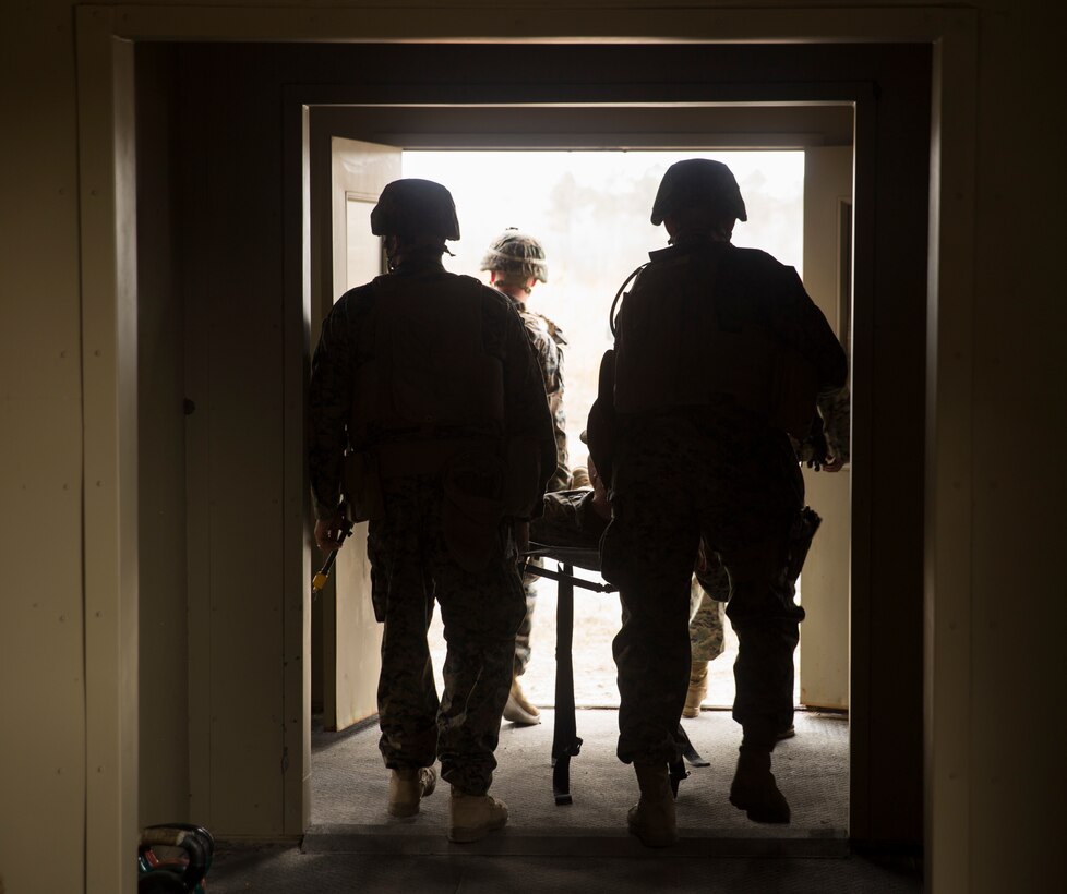 Marines with Task Force Southwest carry a notionally injured Marine to an awaiting vehicle during a mass casualty drill at forward operating base Bravo, Camp Lejeune, N.C., Feb. 28, 2017. The Marines are scheduled to deploy later this year as part of the task force to train, advise and assist the Afghan National Army 215th Corps and 505th Zone National Police in Helmand Province, Afghanistan. (U.S. Marine Corps photo by Sgt. Justin T. Updegraff)