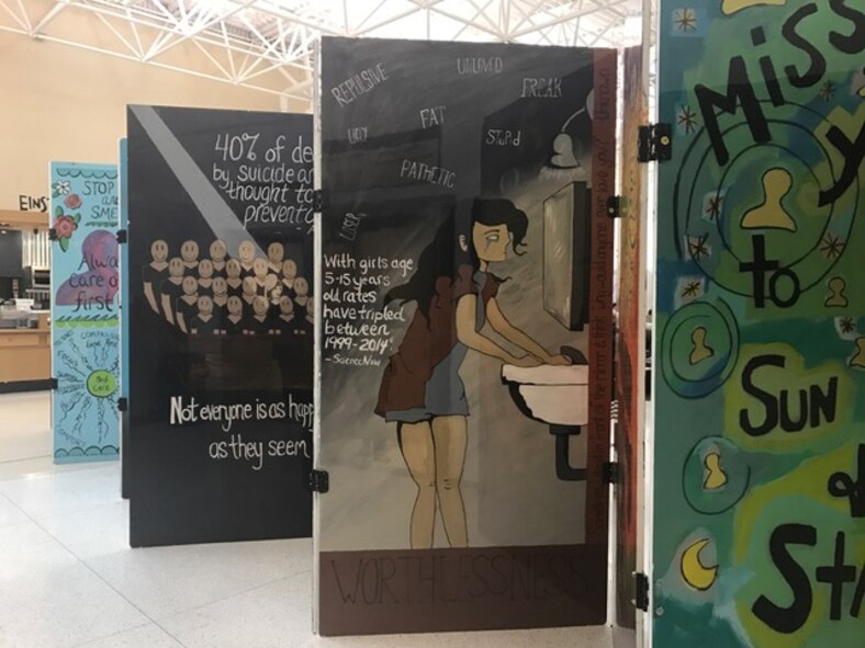 The Signs of Suicide Project traveling art display exhibit will travel every two weeks over the course of the year to other locations throughout the local community and is expected to reach more than 20,000 people. The 88th Medical Group will host the display in the Atrium until March 17. (U.S. Air Force photo/Stacey Geiger)  