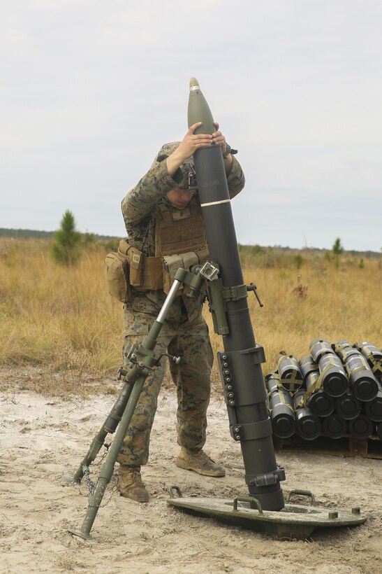 A Marine with Task Force Southwest inserts a round into an 81mm mortar during a live-fire exercise at Camp Lejeune, N.C., March 2, 2017. The exercise was part of the unit’s full mission rehearsal, a week-long training event which enhanced the Marines’ advisory and combat capabilities. Task Force Southwest is comprised of approximately 300 Marines whose mission will be to train, advise and assist the Afghan National Army 215th Corps and 505th Zone National Police. (U.S. Marine Corps photo by Sgt. Lucas Hopkins)