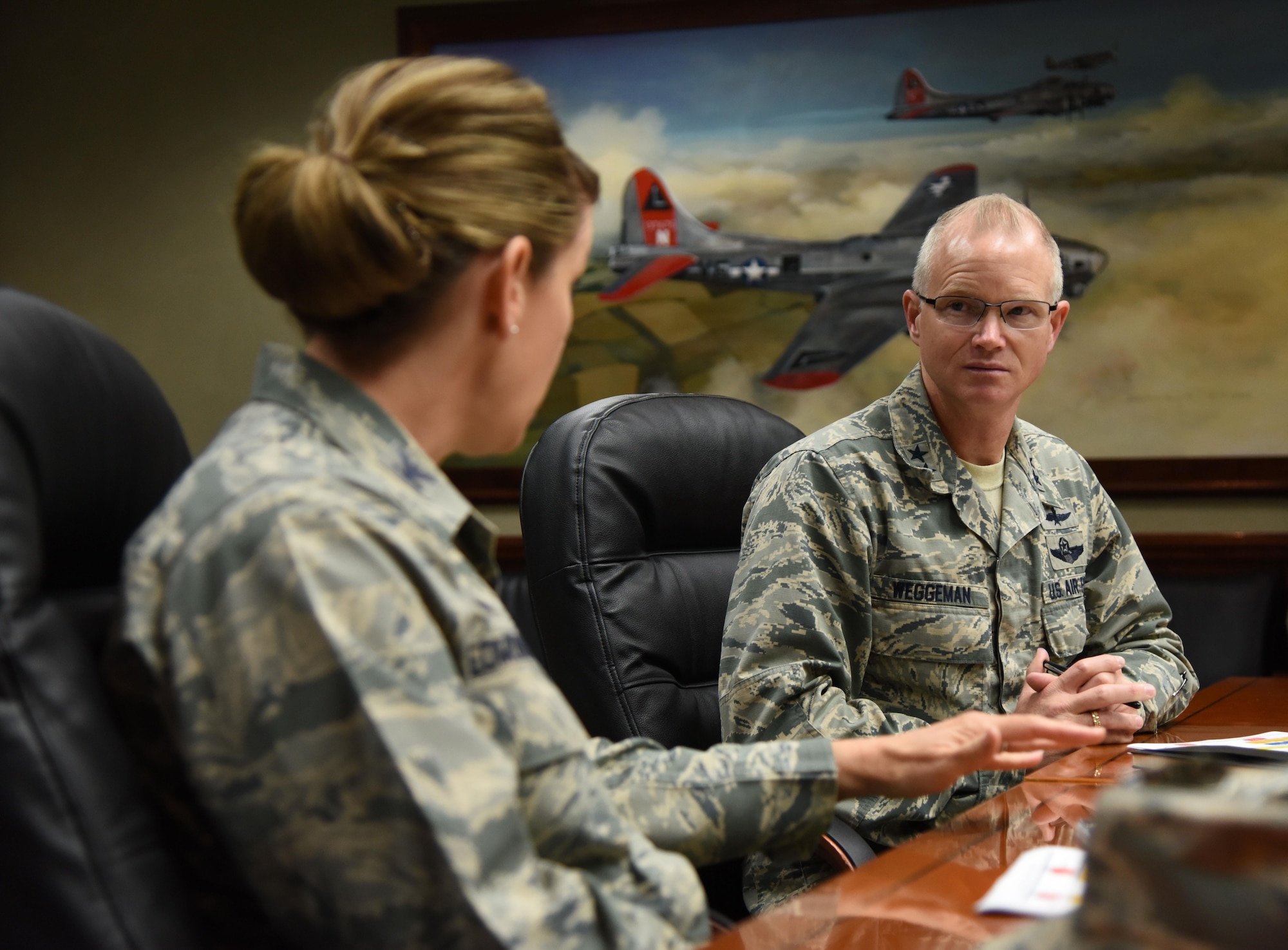 Col. Michele Edmondson, 81st Training Wing commander, speaks to Maj. Gen. Christopher Weggeman, 24th Air Force commander, Joint Base San Antonio-Lackland, Texas, during a 333rd Training Squadron site visit at Stennis Hall March 1, 2017, on Keesler Air Force Base, Miss. Weggeman visited with Airmen linked to the cyber curriculum and received an 85th Engineering Installation Squadron mission brief. (U.S. Air Force photo by Kemberly Groue)