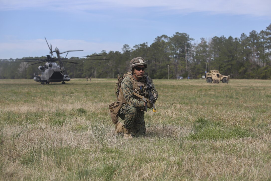 A Marine with Task Force Southwest posts security during a during a Tactical Recovery of Aircraft and Personnel training exercise at Camp Lejeune, N.C., March 2, 2017. From Feb. 27 to March 3, the unit executed a full mission rehearsal to enhance the Marines’ advisory and combat skills in preparation for a deployment to Helmand Province, Afghanistan. Task Force Southwest is comprised of approximately 300 Marines, whose mission will be to train, advise and assist the Afghan National Army 215th Corps and 505th Zone National Police. (U.S. Marine Corps photo by Sgt. Lucas Hopkins)