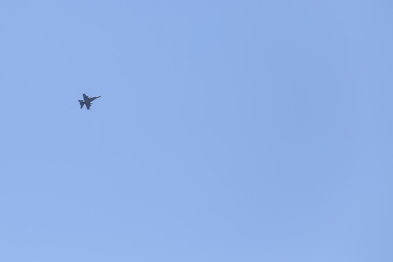 An F/A-18 Hornet flies over Camp Lejeune, N.C. during a full mission rehearsal March 3, 2017. Approximately 300 Marines with Task Force Southwest participated in the week-long exercise, which consisted of live-fire ranges, medical drills and advisory meetings with Afghan role players. Marines with Tthe unit are scheduled to deploy to Helmand Province, Afghanistan in the Spring, where they will train, advise and assist the Afghan National Army 215th Corps and 505th Zone National Police. (U.S. Marine Corps photo by Sgt. Lucas Hopkins)