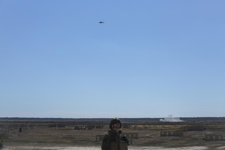 A UH-1Y Venom flies above Camp Lejeune, N.C. in conjunction with the Task Force Southwest full mission rehearsal March 3, 2017. The rehearsal prepared approximately 300 Marines assigned to the unit for an upcoming deployment to Helmand Province, Afghanistan. Marines with Task Force Southwest will train, advise and assist the Afghan National Army 215th Corps and 505th Zone National Police, and are scheduled to deploy later this year. (U.S. Marine Corps photo by Sgt. Lucas Hopkins)