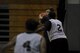 Lukas Anderson, a small forward for the 1st Special Operations Contracting Squadron basketball team, protects the ball from an opponent at Hurlburt Field, Fla., March 2, 2017. The 1st SOCONS defeated the 1st Special Operations Maintenance Squadron 78-62. (U.S. Air Force photo by Airman 1st Class Dennis Spain)