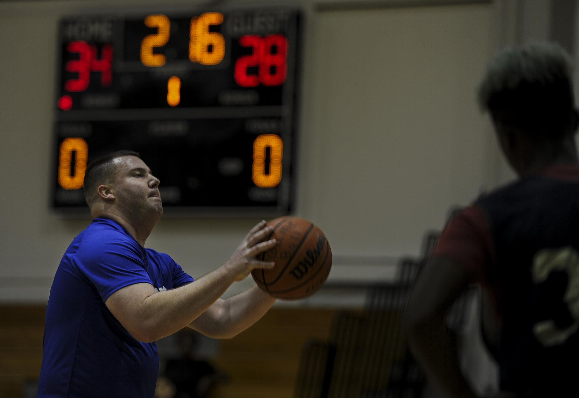 Christopher Rex, a center for the 1st Special Operations Contracting Squadron intramural basketball team, prepares to shoot a free throw during a basketball game at Hurlburt Field, Fla., March 3, 2017. The 1st SOCONS defeated the 1st Special Operations Maintenance Squadron 78-62. (U.S. Air Force photo by Airman 1st Class Dennis Spain)