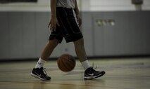 The 1st Special Operations Maintenance Contracting Squadrons compete against each other in a mid-season intramural basketball game at Hurlburt Field, Fla., March 3, 2017. The 1st SOCONS defeated the 1st SOMXS 78-62 making their season record three wins and five losses. (U.S. Air Force photo by Airman 1st Class Dennis Spain)
