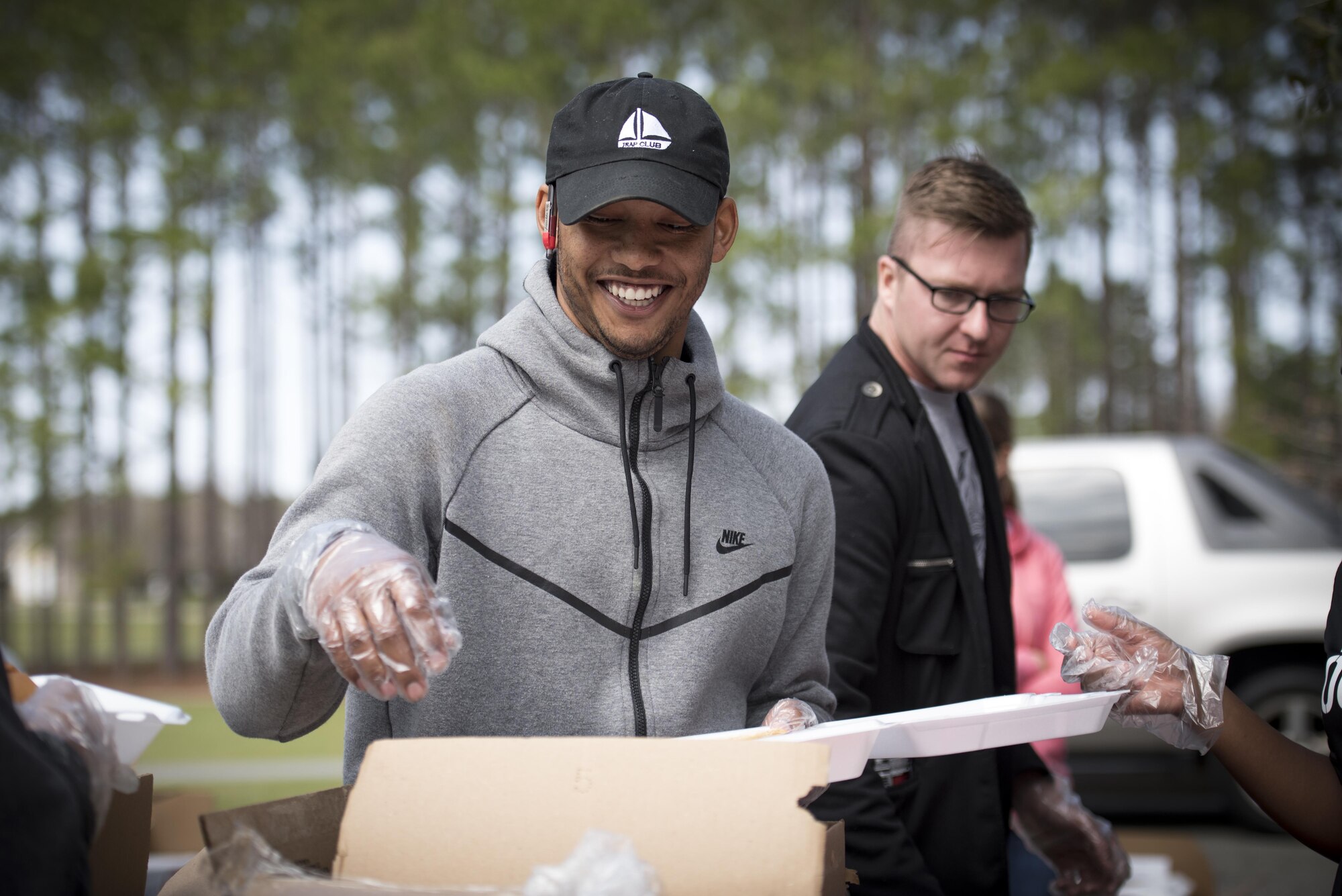 Airman Cedric Ellison, 41st Helicopter Maintenance Unit avionics technician, prepares lunches during the annual Special Olympics, March 2, 2017, at Freedom Park in Valdosta, Ga. More than 80 Moody Air Force Base Airmen volunteered at the event, allowing more than 250 children from five surrounding counties to compete in more than 10 Olympic activities. (U.S. Air Force photo by Airman 1st Class Lauren M. Sprunk)
