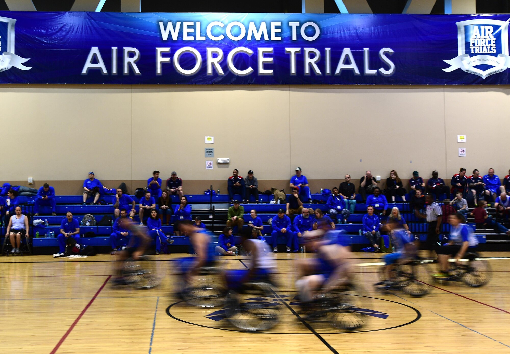 Air Force Wounded Warrior Trials competitors participate in the wheelchair basketball competition March 1, 2017, at Nellis Air Force Base, Nev. AFW2 is a congressionally-mandated, federally-funded program that provides personalized care, services and advocacy to seriously or very seriously wounded, ill or injured total force recovering service members, their caregivers and families. (U.S. Air Force photo by Senior Airman Christian Clausen)