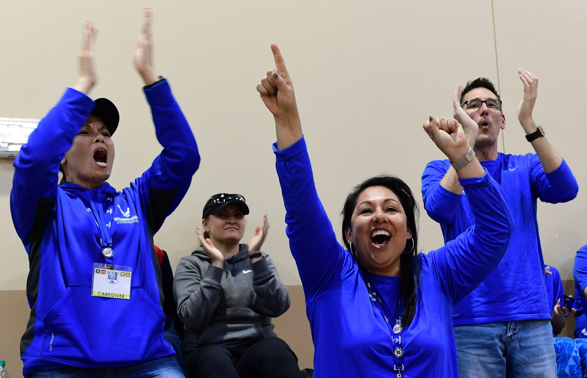 Spectators cheer for the Air Force Wounded Warrior Trials competitors during the wheelchair basketball competition March 1, 2017, at Nellis Air Force Base, Nev. AFW2 provides an opportunity for wounded warriors to compete in sports again. (U.S. Air Force photo by Senior Airman Christian Clausen)