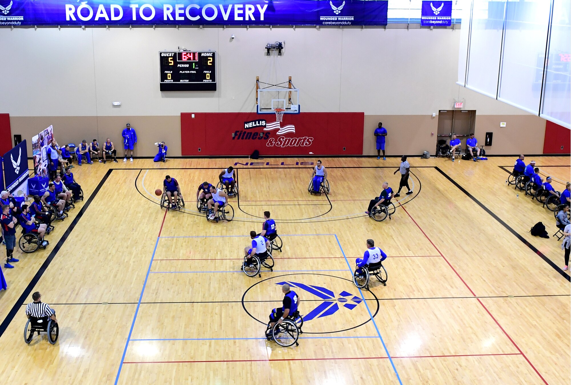 Air Force Wounded Warrior Trials competitors participate in the wheelchair basketball competition March 1, 2017, at Nellis Air Force Base, Nev. AFW2 competitors also competed in wheelchair basketball, wheelchair rugby, sitting volleyball, swimming, track and field, archery, and cycling. (U.S. Air Force photo by Senior Airman Christian Clausen)