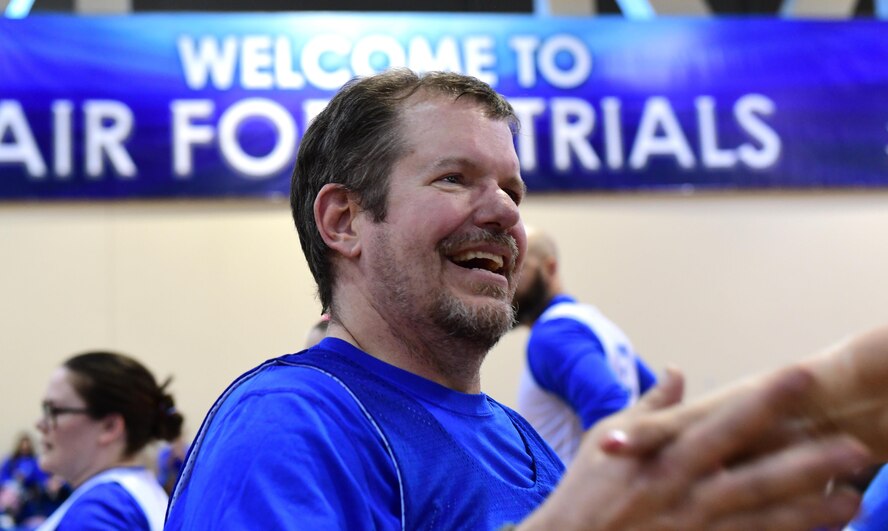 Air Force Wounded Warrior Trials competitors congratulate one another after competing in the wheelchair basketball competition March 1, 2017, at Nellis Air Force Base, Nev. AFW2 inspires espirit de corps and camaraderie through friendly competition. (U.S. Air Force photo by Senior Airman Christian Clausen)