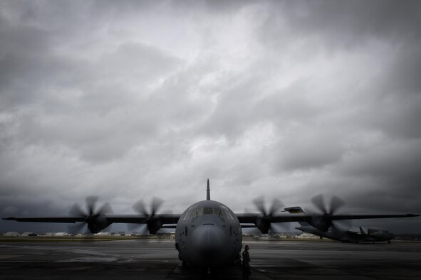 A U.S. Airman with the 36th Airlift Squadron performs a pre-flight inspection at Kadena Air Base, Japan, March 6, 2017. This is the first C-130J to be assigned to Pacific Air Forces. Yokota serves as the primary Western Pacific airlift hub during peacetime and contingency operations. Missions include tactical air land, airdrop, aeromedical evacuation, special operations and distinguished visitor airlift.  (U.S. Air Force photo by Staff Sgt. Michael Smith)