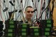 U.S. Air Force Airman 1st Class Hunter Pendry, 20th Communications Squadron client systems technician, smiles from between wires at Shaw Air Force Base, S.C., March 2, 2017. The 20th CS client service center repairs and protects all 20th Fighter Wing communication devices. Their mission statement is to provide combat-ready Airmen to ensure mission communications on time, every time. (U.S. Air Force photo by Airman 1st Class Destinee Sweeney)