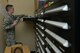 U.S. Air Force Airman 1st Class Hunter Pendry, 20th Communications Squadron client systems technician, stores excess computer parts at Shaw Air Force Base, S.C., March 2, 2017. The client service center repairs and protects all 20th Fighter Wing Secret Internet Protocol Router and Non-classified Internet Protocol Router network devices. (U.S. Air Force photo by Airman 1st Class Destinee Sweeney)