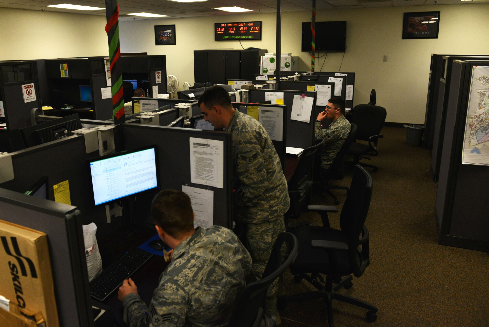 U.S. Airmen assigned to the 20th Communications Squadron client service center ensure computer hardware and software is functional at Shaw Air Force Base, S.C., March 2, 2017. The 20th CS is preparing for an upcoming Command Cyber Readiness Inspection which will test the 20th Fighter Wing’s cyber readiness against Air Force and Defense Department standards. (U.S. Air Force photo by Airman 1st Class Destinee Sweeney)